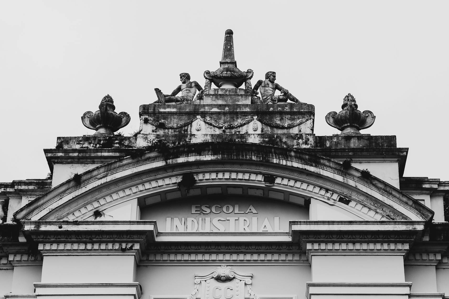 Black and white photo capturing the intricate details of Escola Industrial's architecture in Santa Maria, Brazil.