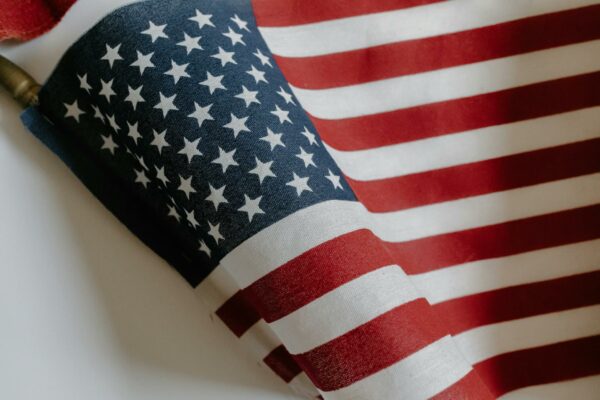Detailed view of the American flag showing stars and stripes in a close-up angle.